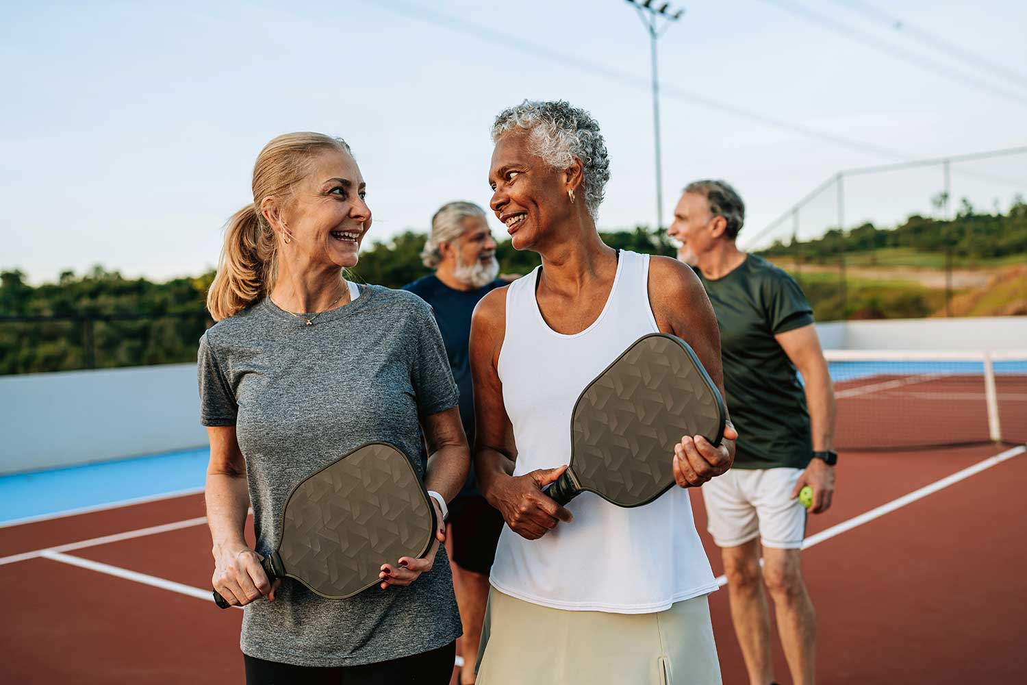 Seniors playing pickleball